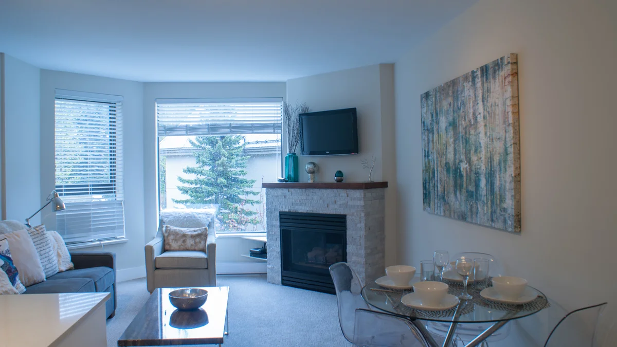 Living and dining area with fireplace