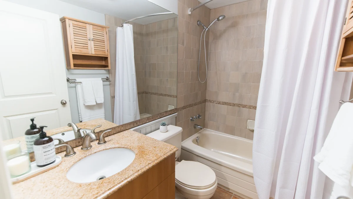 Washroom with granite countertops