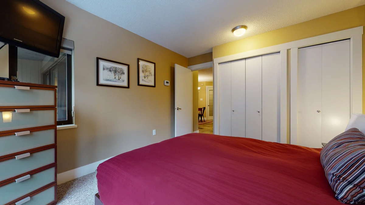 View of bedroom and TV