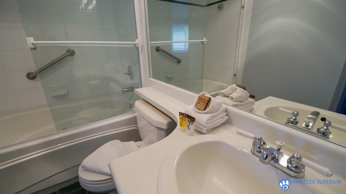 Washroom with shower-tub combo