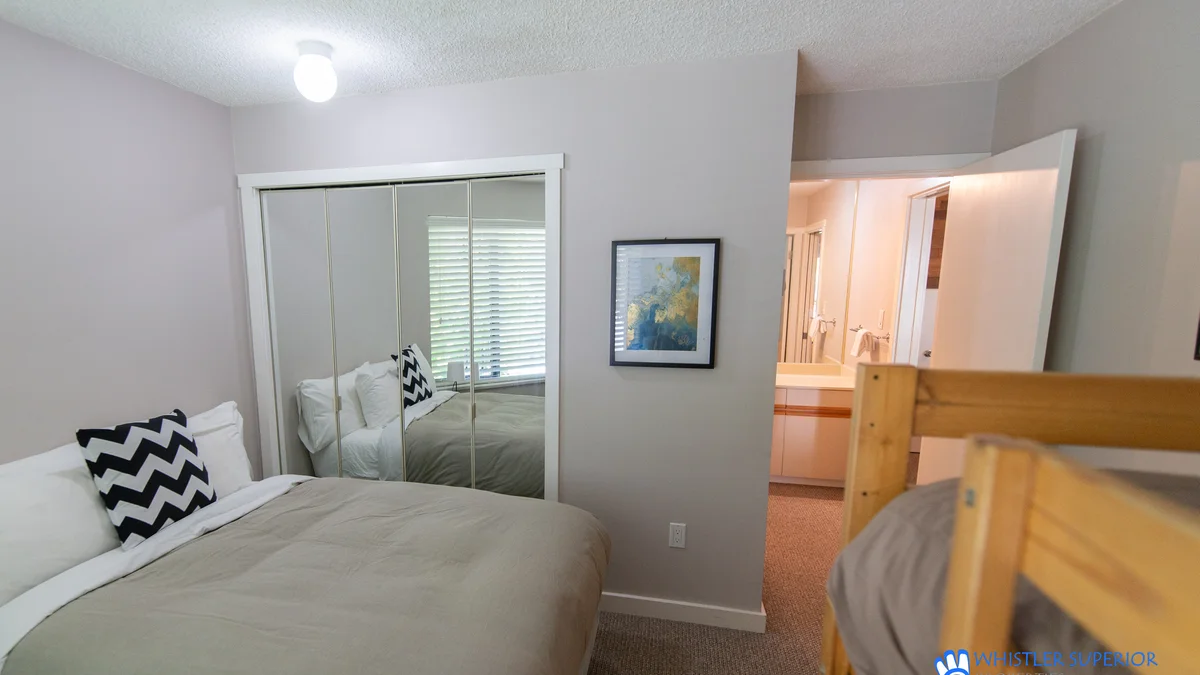 Double + twin bunk in lower level room